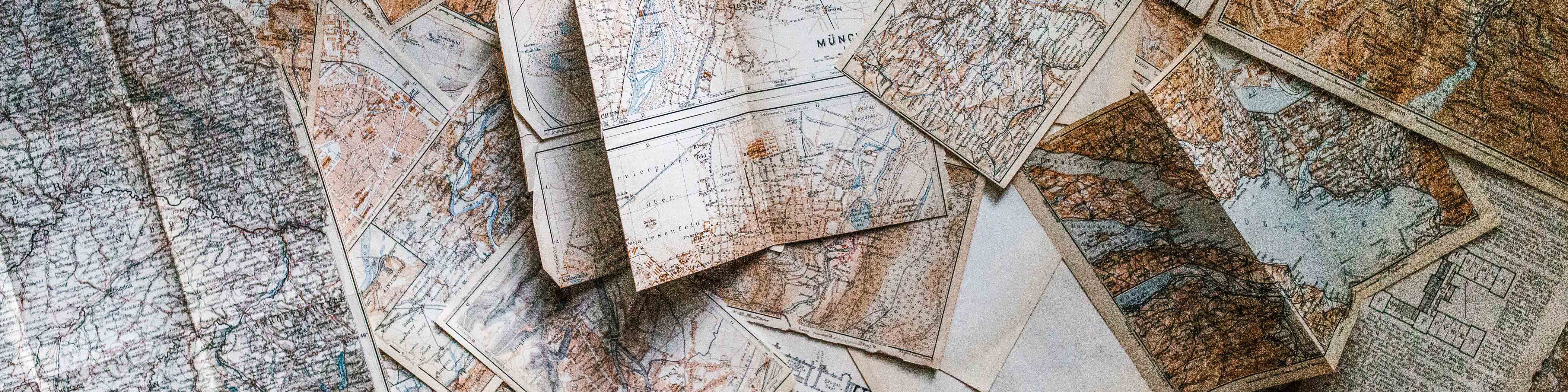 A flatlay photo of maps.
