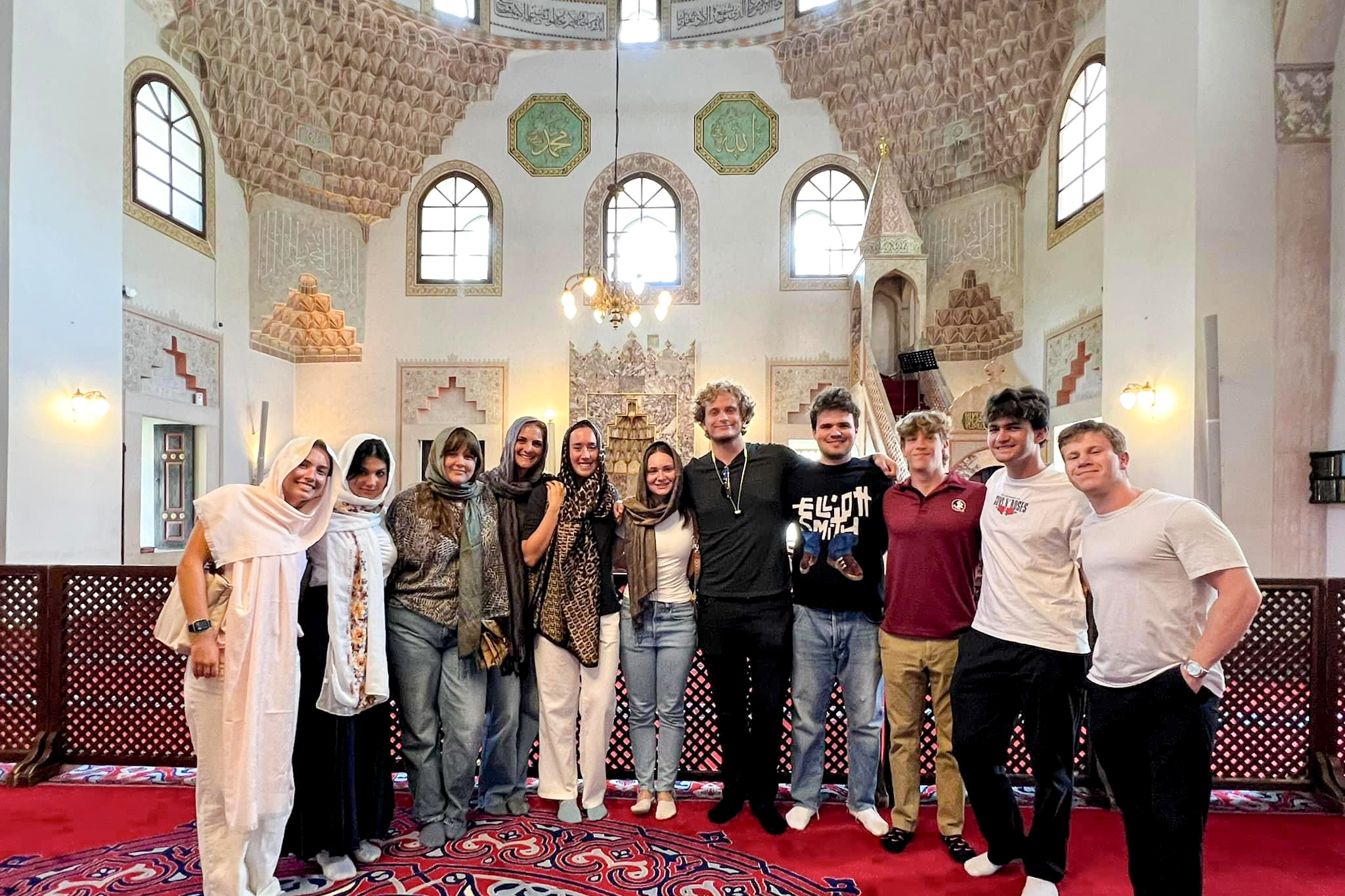 Students pose in a historic religious site in Dubrovnik