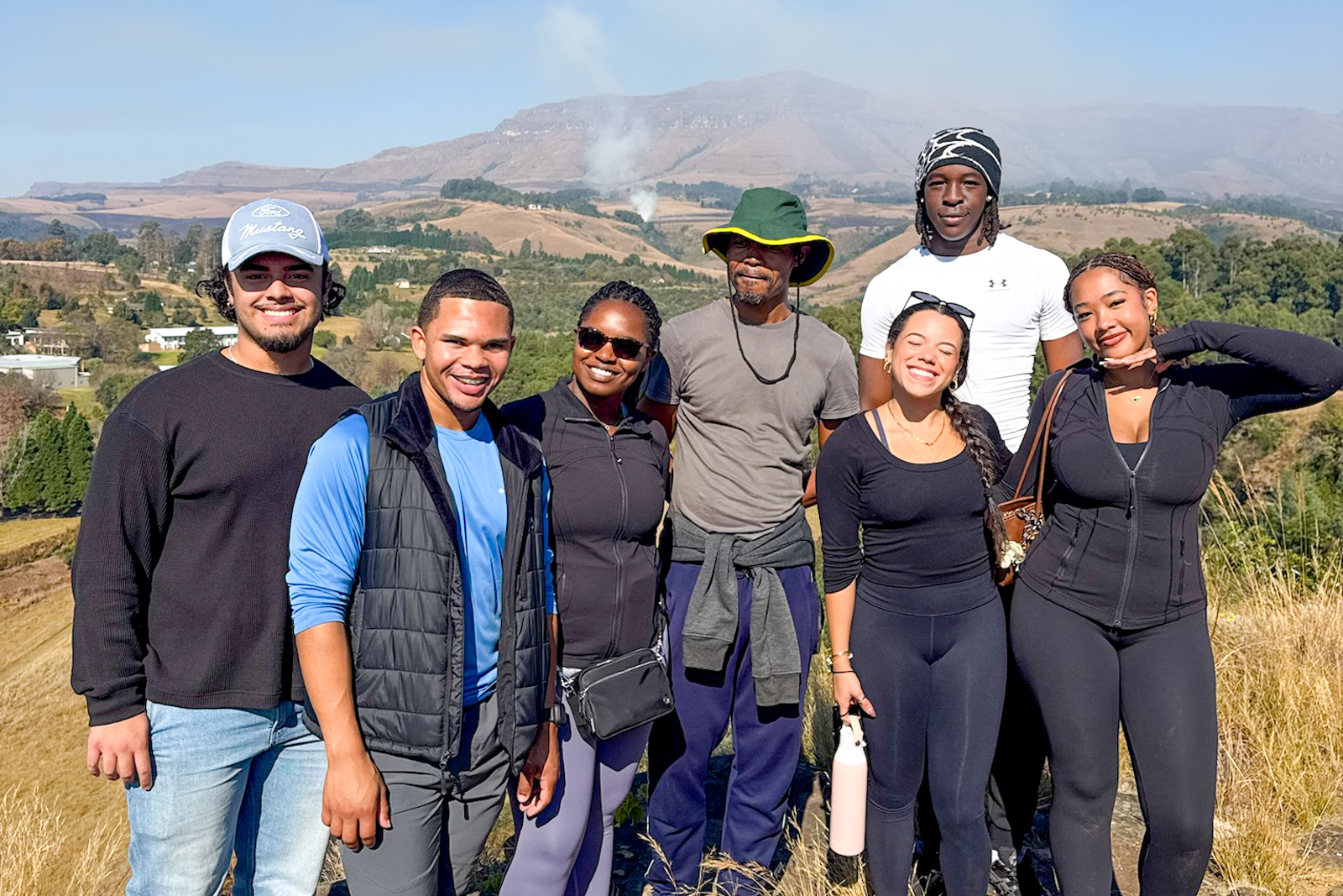 Students posing together on a hike in South Africa