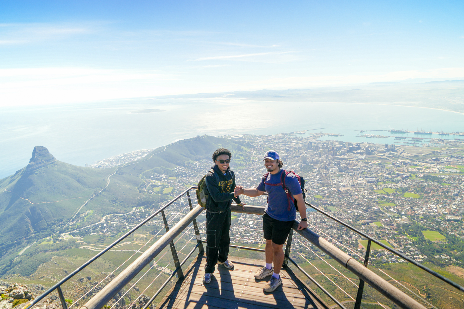 Students posing together with a sweeping view in the background.