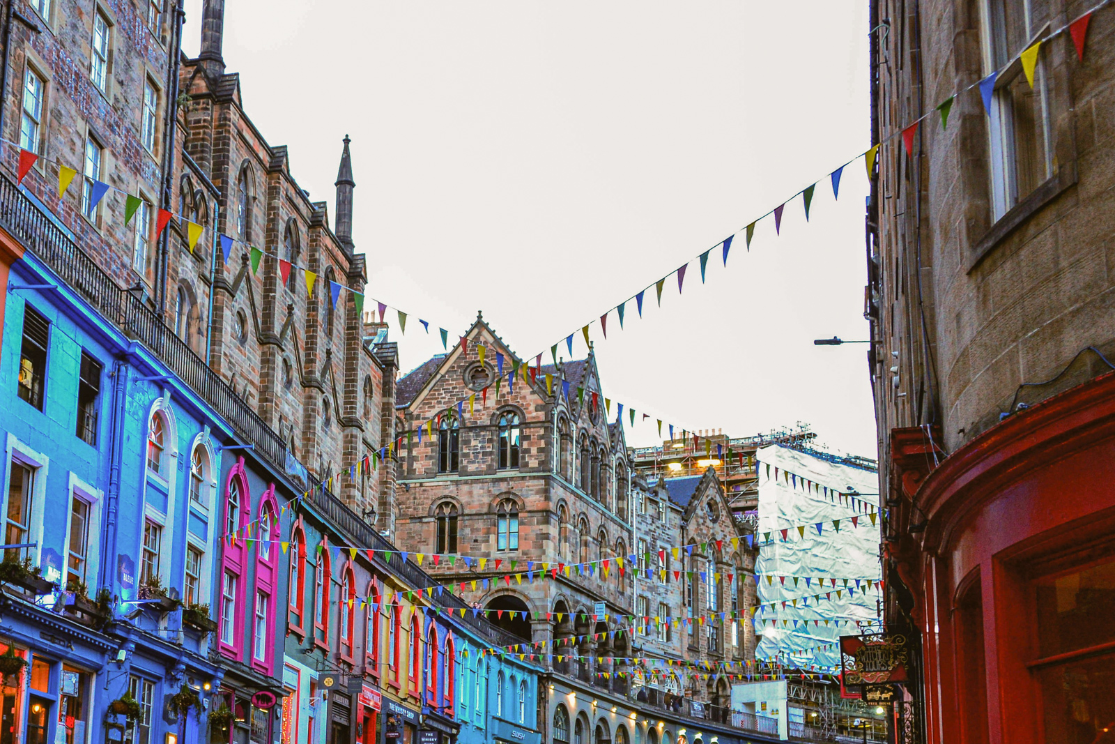 A view of a colorful street in Edinburgh.
