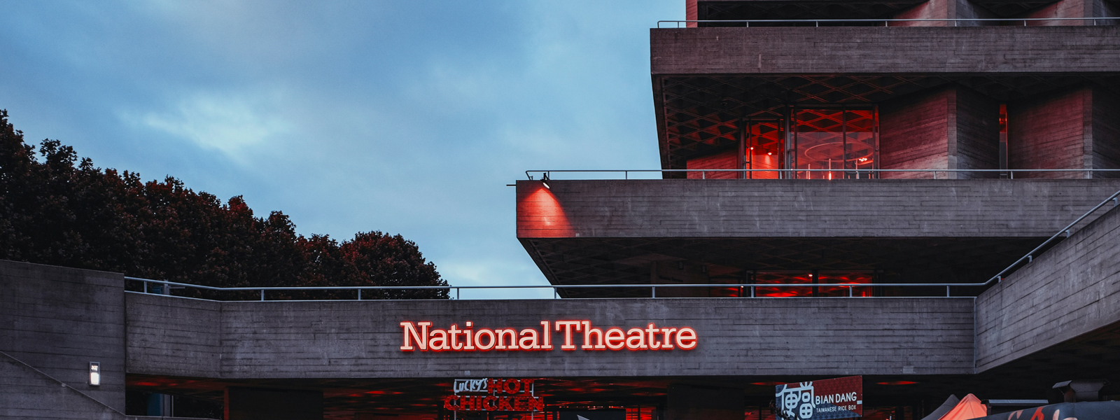 The National Theatre in London at dusk. 