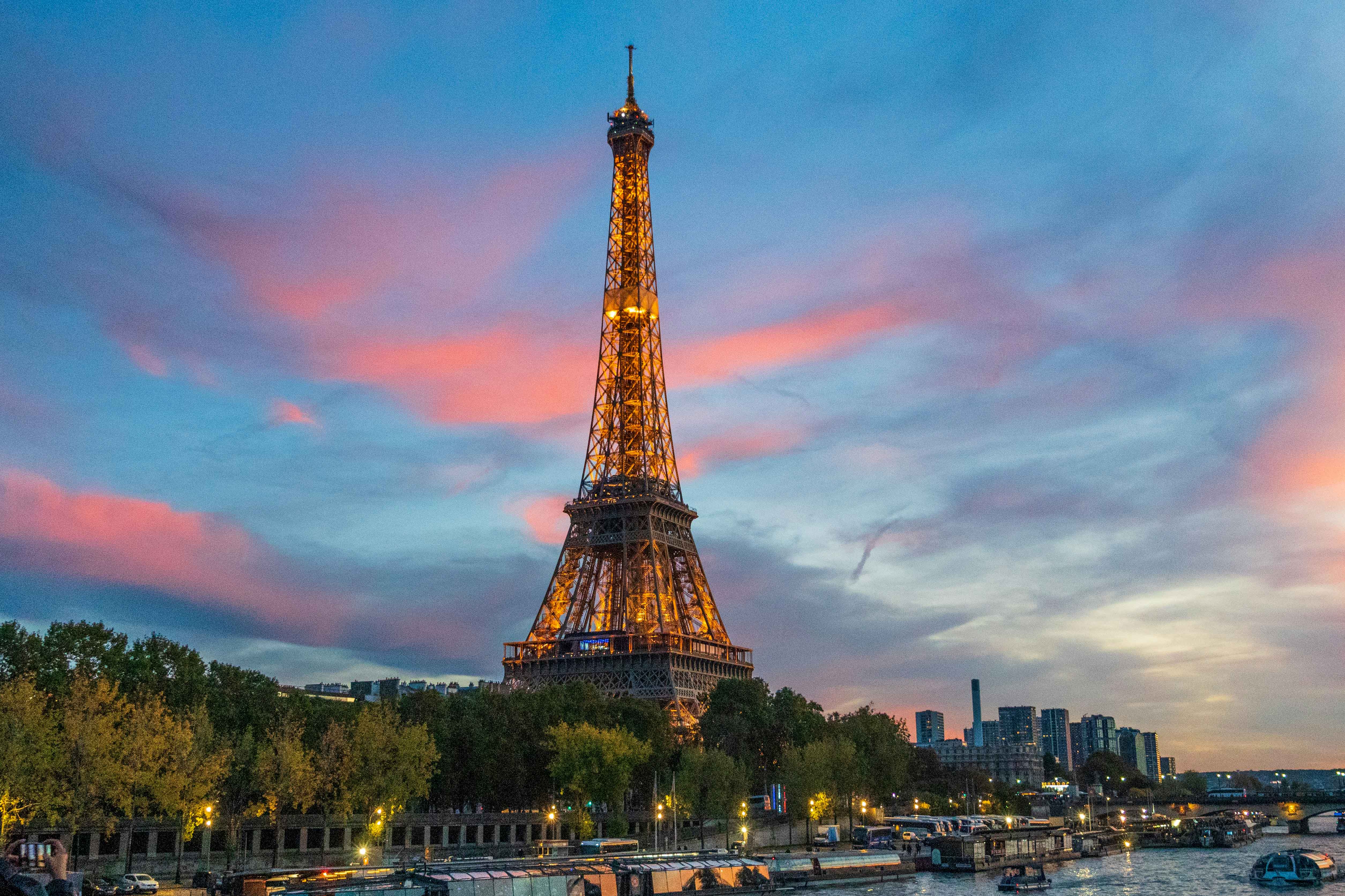 A view of the Eiffel Tower and River Seine at sunset.