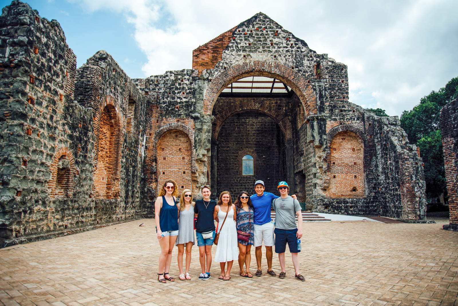 Students posing at a historic site in Panama.