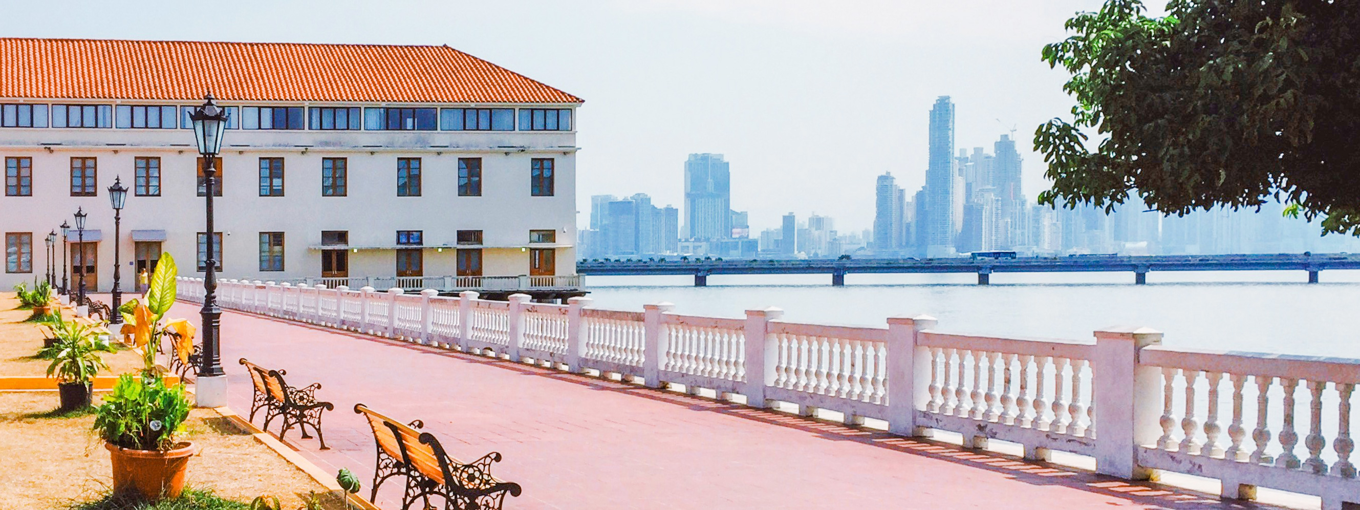 A view of the historic Casco Viejo neighborhood in Panama with a view of downtown Panama City in the distance.