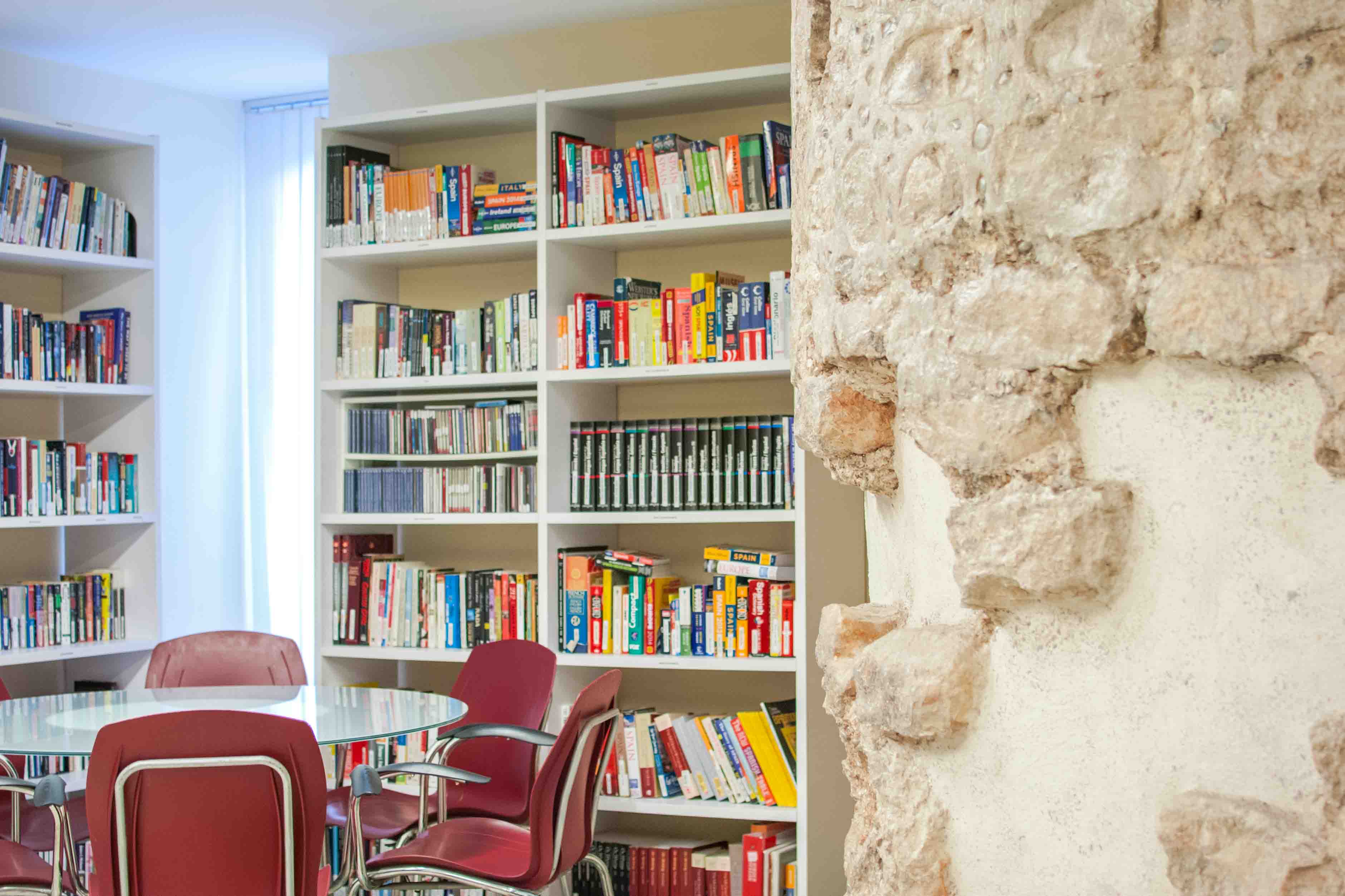 A view of the FSU Valencia library, which features an exposed 10th century Moorish wall.