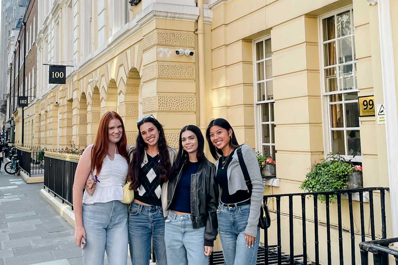 Four students pose in front of the FSU study center building on Great Russell Street.