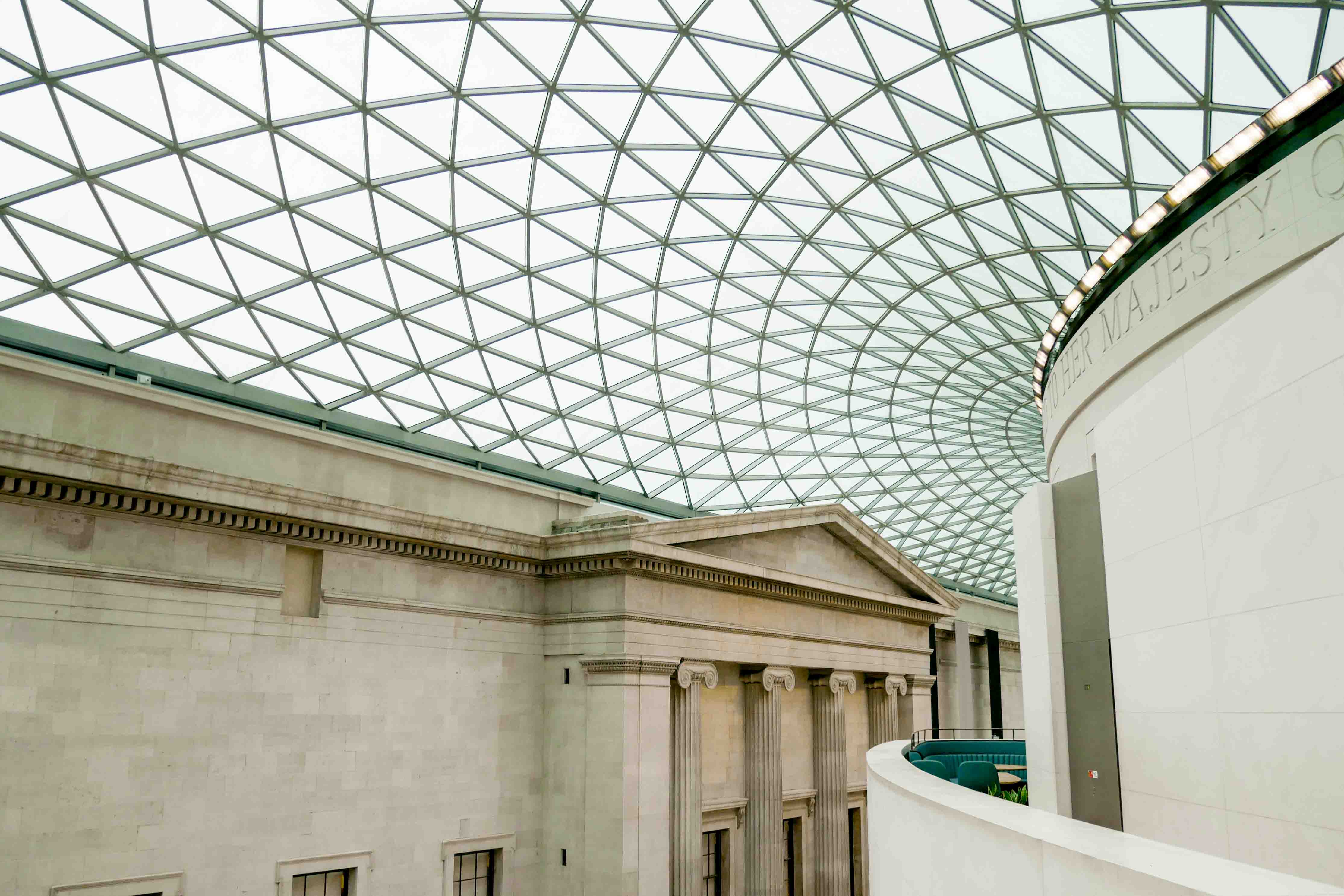 The inside of the British Museum, featuring modern and historic architecture.