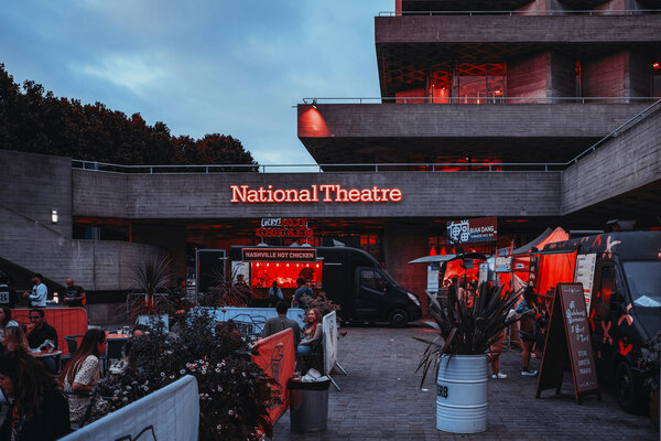 A view of the National Theatre in London at dusk.