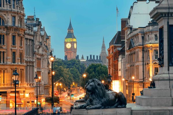 A view of Big Ben from Trafalgar Square at dusk.