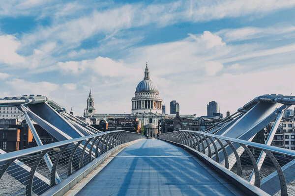 A view of the Millennium Bridge in front of St. Pauls Cathedral.