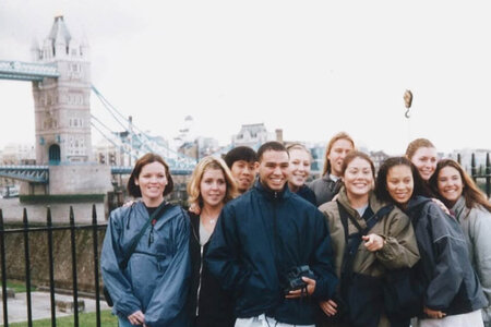 Students in the early 2000s pose in front of Tower Bridge in London.